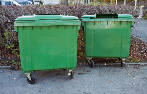 Construction site in Twickenham with waste disposal containers